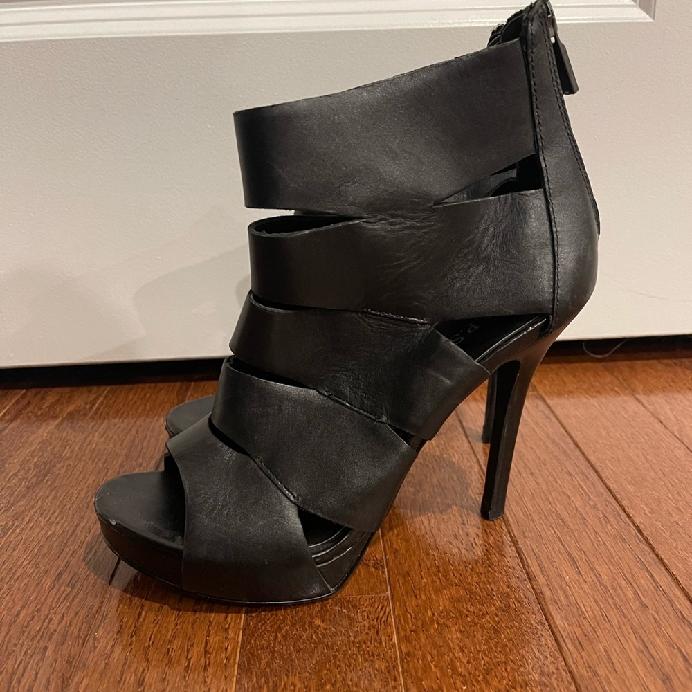 Black heels with slits on sides